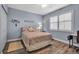 Charming bedroom features a comfortable bed, stylish decor, and bright natural light from window at 2625 Terra Ceia Bay Blvd # 503, Palmetto, FL 34221