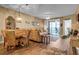 Inviting living room with wood-look floors, comfortable seating, and water view balcony at 2625 Terra Ceia Bay Blvd # 503, Palmetto, FL 34221