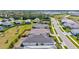 This aerial view highlights the homes and landscaping, offering a glimpse of the community at 2720 Butterfly Jasmine Trl, Sarasota, FL 34240