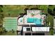 A bird's-eye view showing the pool, spa, and shuffleboard area surrounded by lounge chairs at 2832 74Th W St # 2180, Bradenton, FL 34209