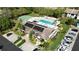 Overhead view showing community amenities: shuffleboard, pool, clubhouse, and accessible parking at 2832 74Th W St # 2180, Bradenton, FL 34209