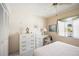 Cozy bedroom features built-in dresser, large closet and ample natural light at 2832 74Th W St # 2180, Bradenton, FL 34209