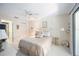 Bright bedroom featuring neutral tones, comfortable bedding, and lots of natural light at 2832 74Th W St # 2180, Bradenton, FL 34209