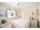 Comfortable bedroom with a ceiling fan, and well-lit interior at 2832 74Th W St # 2180, Bradenton, FL 34209