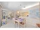 Spacious dining room open to the living area, perfect for entertaining guests at 2832 74Th W St # 2180, Bradenton, FL 34209