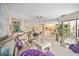 Spacious living area with comfortable seating, neutral decor and open layout to dining area at 2832 74Th W St # 2180, Bradenton, FL 34209