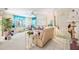 Inviting living room with ample natural light, neutral decor and tiled foyer entry at 2832 74Th W St # 2180, Bradenton, FL 34209