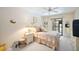 Relaxing main bedroom with a private door to the outside, filled with natural light at 2832 74Th W St # 2180, Bradenton, FL 34209