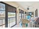 Enclosed patio with a comfortable seating arrangement and scenic views of the outdoors at 2832 74Th W St # 2180, Bradenton, FL 34209