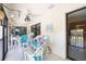 Comfortable seating with outdoor views through sliding glass doors in this lovely patio at 2832 74Th W St # 2180, Bradenton, FL 34209