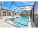 Inviting screened pool and hot tub area with views of adjacent homes and blue skies at 3421 Bayou Sound, Longboat Key, FL 34228