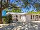 Private backyard featuring a built-in grill and outdoor seating at 3629 Almeria Ave, Sarasota, FL 34239