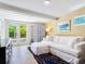 Comfortable living room with neutral walls, comfortable seating, and direct patio access at 3629 Almeria Ave, Sarasota, FL 34239