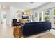 Bright living room showcasing stylish décor, comfortable seating, and seamless flow to the outdoors at 3629 Almeria Ave, Sarasota, FL 34239