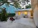 Cozy patio with a grill and dining set, perfect for enjoying outdoor meals at 3629 Almeria Ave, Sarasota, FL 34239