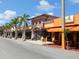 Commercial buildings with palm trees offer a shopping and dining experience at 3629 Almeria Ave, Sarasota, FL 34239