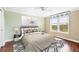Comfortable bedroom featuring a large window and modern decor at 3750 Pinebrook Circle # Apt 505, Bradenton, FL 34209