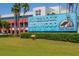Pinebrook Ironwood Golf Club sign welcomes the public, framed by manicured lawns and palm trees at 3750 Pinebrook Circle # Apt 505, Bradenton, FL 34209