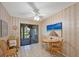 Bright breakfast nook with tile flooring, table, and sliding door access to the outdoors at 3825 Wilshire Cir # 1, Sarasota, FL 34238