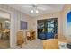 Cozy breakfast nook features tile flooring, a table with chairs, and a sliding door leading to an outdoor patio at 3825 Wilshire Cir # 1, Sarasota, FL 34238