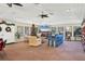 A vibrant lounge with a Christmas tree, comfortable seating, and a cozy atmosphere at 3825 Wilshire Cir # 1, Sarasota, FL 34238