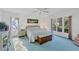 Inviting bedroom with natural light, cozy bed, bench and an inviting window seat at 3825 Wilshire Cir # 1, Sarasota, FL 34238