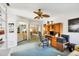 Home office featuring a ceiling fan, a desk, and a nice view of the home at 3825 Wilshire Cir # 1, Sarasota, FL 34238
