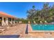 Inviting community pool area, complete with ample lounge chairs for relaxation under the sun at 3825 Wilshire Cir # 1, Sarasota, FL 34238