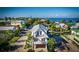 Charming two-story home with a metal roof, balcony, and water views located in a residential neighborhood at 401 20Th Pl, Bradenton Beach, FL 34217