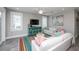 Bright living room featuring stylish furniture, colorful decor, and bright natural light at 401 20Th Pl, Bradenton Beach, FL 34217
