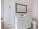 Bathroom featuring a white vanity and a large mirror with excellent storage at 4205 Higel Ave, Sarasota, FL 34242