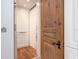 Home elevator with hardwood floors and detailed trim, providing modern convenience at 4205 Higel Ave, Sarasota, FL 34242