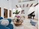 Spacious living room featuring high ceilings, modern decor, and elegant furnishings at 4205 Higel Ave, Sarasota, FL 34242