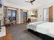 Spacious main bedroom featuring french doors and a seating area, offering a relaxing retreat at 4205 Higel Ave, Sarasota, FL 34242