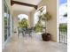Outdoor seating area with a dining table and views of lush landscaping at 4205 Higel Ave, Sarasota, FL 34242
