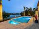 Outdoor pool with a spa and waterfront views at 4205 Higel Ave, Sarasota, FL 34242