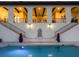Luxury home featuring a beautiful pool, symmetrical staircases and well-manicured outdoor space at 4205 Higel Ave, Sarasota, FL 34242