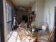 Inviting balcony with a table, chairs, and a water view at 4555 Bay Club Dr # 22, Bradenton, FL 34210
