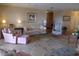 Inviting living room features tile floors, comfortable seating, and ample natural light at 4555 Bay Club Dr # 22, Bradenton, FL 34210