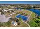 Community amenities including pool, basketball court, and lake provide residents outdoor recreation options at 4706 Roycroft Ter, Parrish, FL 34219