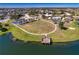 Community lakeside amenities with basketball court, pool, and pier are close to homes at 4706 Roycroft Ter, Parrish, FL 34219