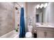 Bright bathroom featuring a shower-tub combo, a toilet, and vanity with sink at 4706 Roycroft Ter, Parrish, FL 34219