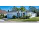 Attractive single-story residence with a two-car garage, vibrant landscaping, and a well-maintained lawn at 4706 Roycroft Ter, Parrish, FL 34219