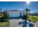 Well-kept one story house with a paver driveway leading to a two-car garage, and a tidy front yard at 4706 Roycroft Ter, Parrish, FL 34219