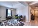 Home office space with natural light and modern lighting fixture at 4706 Roycroft Ter, Parrish, FL 34219
