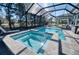 Screened-in pool and hot tub with pavers and plenty of seating at 4706 Roycroft Ter, Parrish, FL 34219