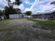 Spacious backyard with a large lot, shed and patio area, great for outdoor entertaining at 503 Olive Ave, Nokomis, FL 34275