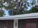 Charming exterior view with new roof, paint, and updated windows at 503 Olive Ave, Nokomis, FL 34275