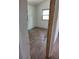 Cozy room boasts new laminate flooring, a window, and a peaceful setting at 503 Olive Ave, Nokomis, FL 34275