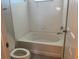 Bathroom featuring bathtub and toilet at 5701 Bentgrass Dr # 18-203, Sarasota, FL 34235